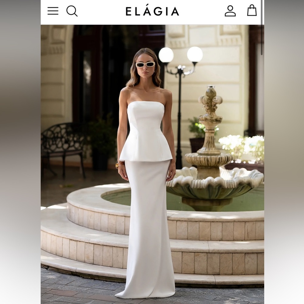 Elagia Ines white strapless peplum top & maxi skirt 2-piece set